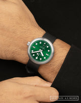 Man wearing Agumbe wristwatch with striking BWC signature Kumaon black FKM hight density rubber strap.