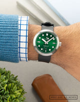 Man wearing Agumbe wristwatch on his wrist, showcasing the watch’s sleek design and modern style.