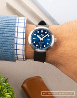 Man wearing the Laccadive wristwatch with an FKM Kumaon Black strap, highlighting its sleek design and bold look.