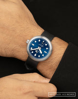 Man wearing Laccadive wristwatch with striking BWC signature black FKM hight density rubber strap.