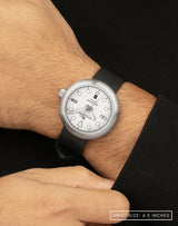 Man wearing the Zanskar wristwatch, featuring the bold Kumaon black FKM high-density rubber strap.