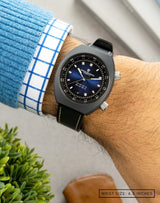 Horizon watch on the wrist, showing the dial with a sunray pattern and strong Cerasteel™ case.