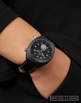 Woman with hand in pocket, wearing the Karman Line wristwatch, showing its clean, modern style.