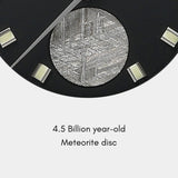 6H position on the Apogee Manzinus II wristwatch features a 4.5 billion-year-old Muonionalusta meteorite disc.