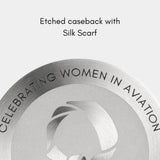 Close-up of the MACH 1 Silk Scarf wristwatch caseback, featuring an engraving of an aviator's scarf, honouring women in aviation.