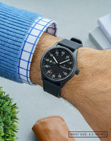 Man wearing MACH 1 Aviator Stealth Fighter wristwatch on his wrist, highlighting its bold design and modern style.