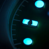 Agumbe wristwatch dial with designed index at 9H showcasing a tree icon - depicting the forests, 3H showcases a wave pattern, symbolising the oceans.