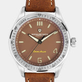 Close-up of the Cover Drive Pitch wristwatch dial, featuring cricket-inspired details and a matte-brown colour.