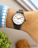 Man wearing MACH 1 Avalanche watch on wrist, focusing on the unique dial pattern.