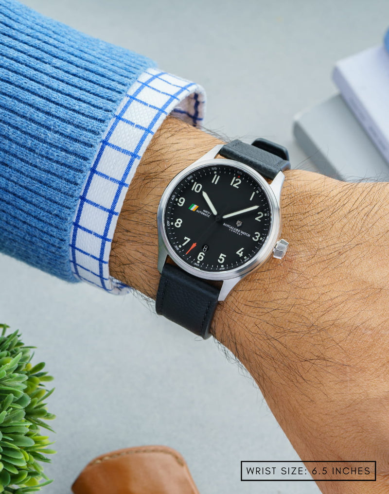 MACH 1 Civilian Steel wristwatch on the wrist, showcasing its clean design and aviation-inspired details.