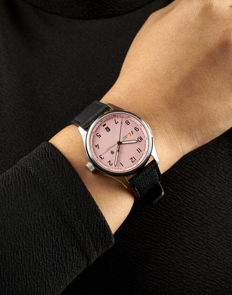 Woman wearing MACH 1 Silk Scarf wristwatch from chest angle, focusing on the unique Frostpeak dial pattern and aviation style.