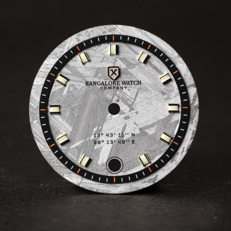 Close-up of the Extraterrestrial watch dial, featuring a unique Muonionalusta meteorite pattern, making each watch one-of-a-kind.