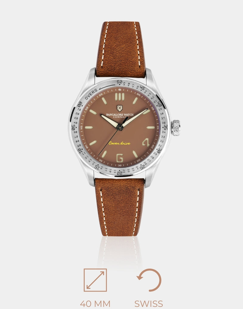 The Pitch – Cricket-inspired wristwatch with sandwich-styled dial, diamond-cut rhodium-plated hands, and cricket-themed details.